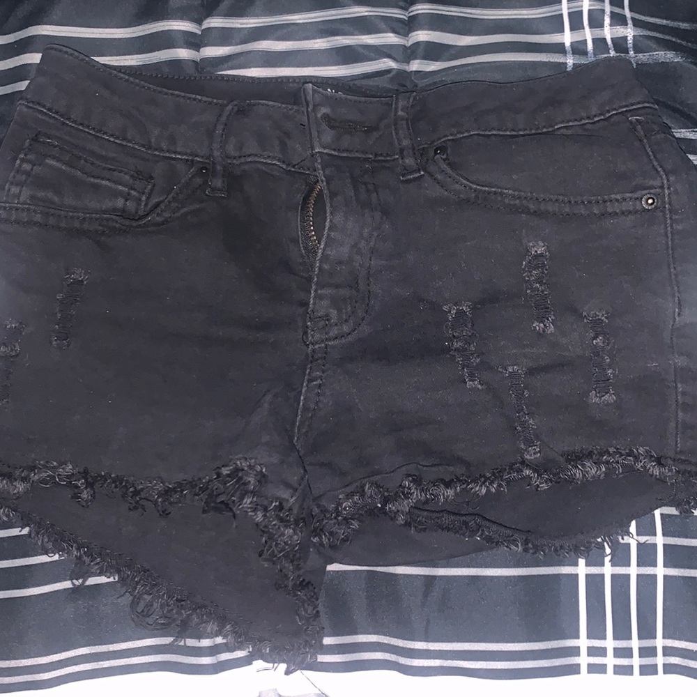 distressed black shorts